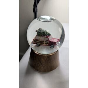 Christmas Snow Globe with Red Woody Station Wagon Car and Tree on Wood Base